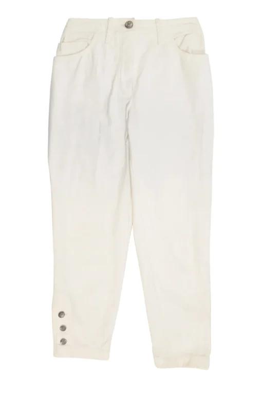 Ecru cotton denim pull-on high-rise skinny jeans with Coco Mark shank button appliqué along cuffs