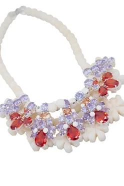 Ek Thongprasert necklace in white silicone, with lilac, and red crystals.