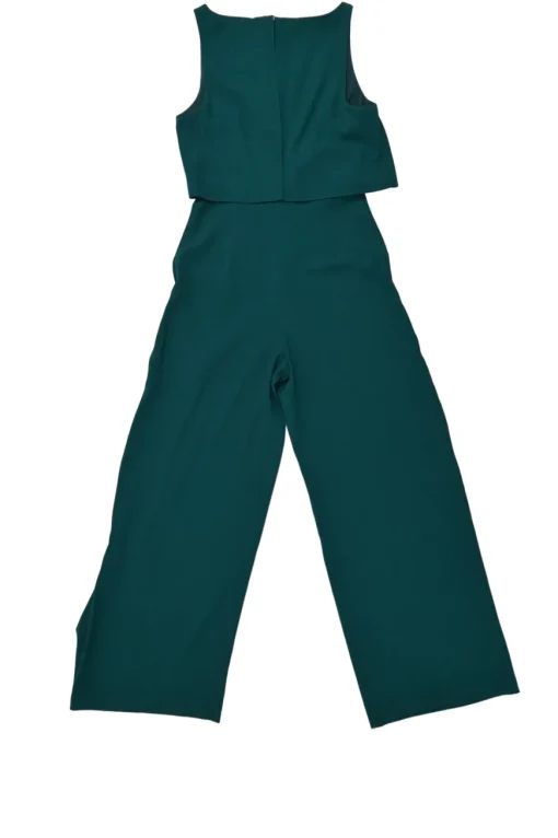 Emerald green draped polyester crêpe bi-layer jumpsuit with cascade ruffle hip detailing