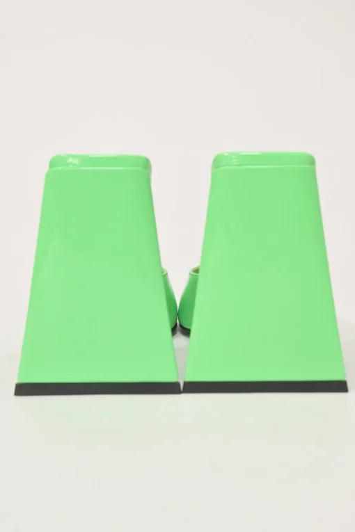 Fluo green patent leather Devon slide mules with square toes and pyramid heels
