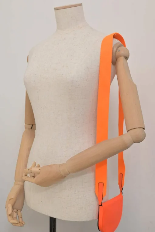 Fluo orange anagram-embossed leather Heel Pouch crossbody bag