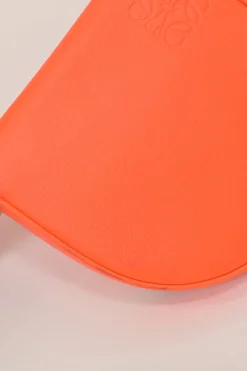 Fluo orange anagram-embossed leather Heel Pouch crossbody bag