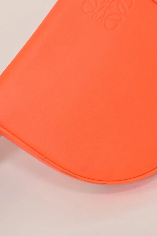 Fluo orange anagram-embossed leather Heel Pouch crossbody bag