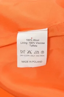 Fluo orange wool two-piece suit set featuring notch lapel tie-waist blazer and cutout tailored trousers
