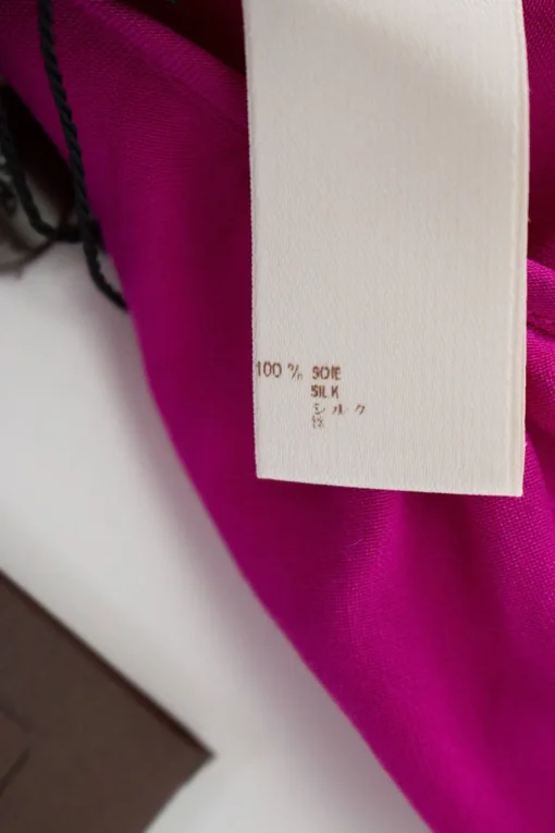 Fuchsia halterneck jumpsuit with braided straps