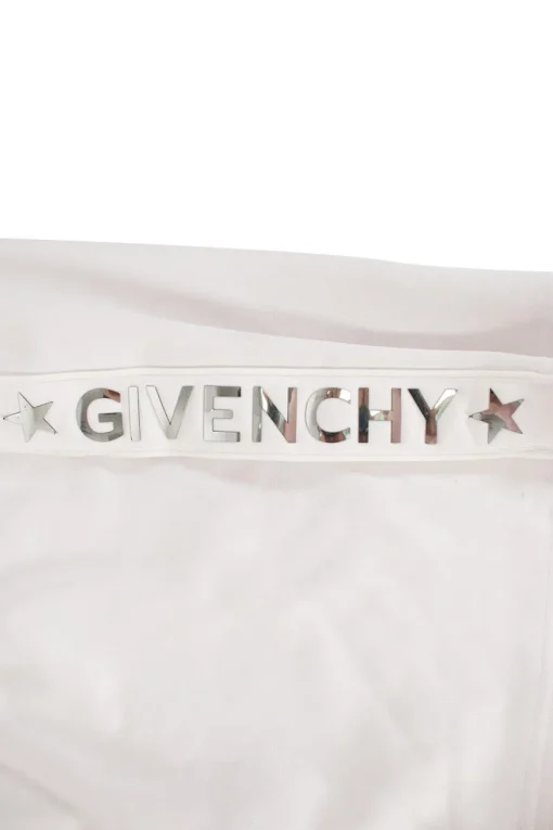 Givenchy white sports skirt with elasticated waist band, drawstring, side pockets with zips, and branding in mirror letters on sides