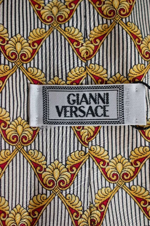 gold and red print silk tie