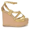 Gold foiled lambskin, raffia, and wood cutout platform wedge sandals with buckle strap fastening