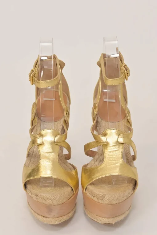 Gold foiled lambskin, raffia, and wood cutout platform wedge sandals with buckle strap fastening