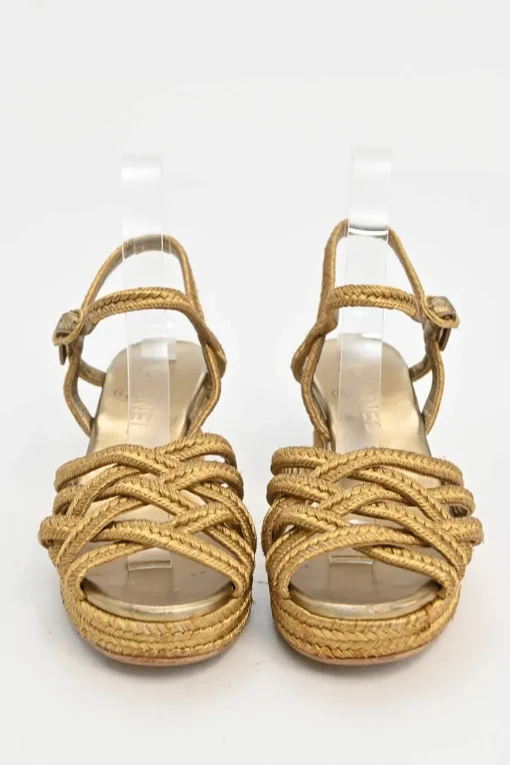 Gold foiled leather and straw almond-toe criss-cross wedge sandals with buckle strap fastening