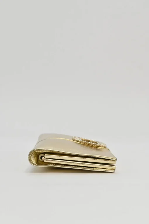 Gold foiled leather petit Pilgrim De Luxe buckle clutch with kiss lock fastening