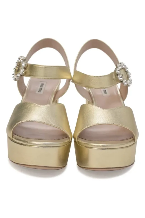 Gold foiled leather round-toe platform sandals with embellished buckle strap fastening