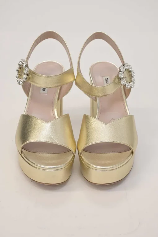 Gold foiled leather round-toe platform sandals with embellished buckle strap fastening