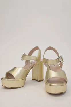 Gold foiled leather round-toe platform sandals with embellished buckle strap fastening