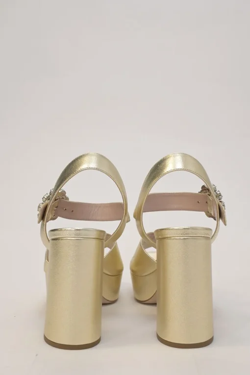 Gold foiled leather round-toe platform sandals with embellished buckle strap fastening