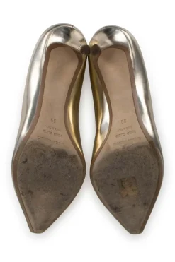 Gold leather pumps