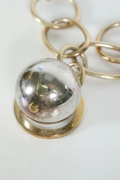 gold tone chunky chain necklace with oversized silver ball pendant