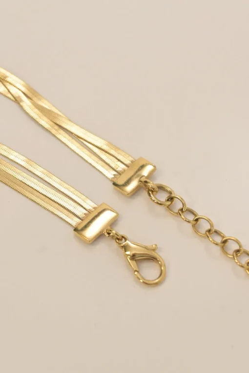 Gold-finish brass herringbone chain multi-strand layered opera necklace featuring D pendant and lobster clasp closure