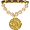 Gold-finish hammered metal, leather, and resin faux pearl Coco Mark medallion brooch