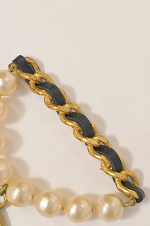 Gold-finish hammered metal, leather, and resin faux pearl Coco Mark medallion brooch