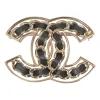 Gold-finish metal and leather Coco Mark brooch