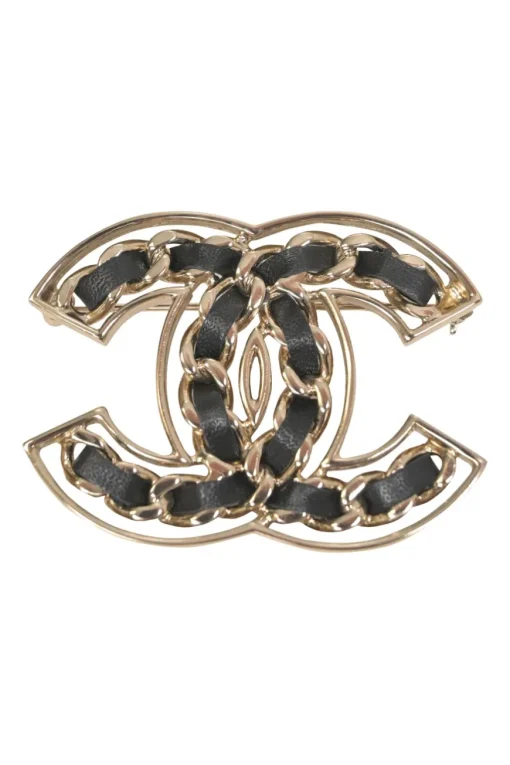Gold-finish metal and leather Coco Mark brooch