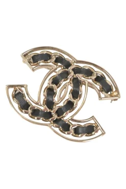 Gold-finish metal and leather Coco Mark brooch
