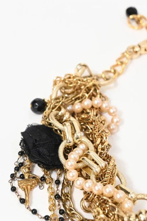 Gold-finish metal and resin faux pearl charm bib necklace with lobster clasp closure