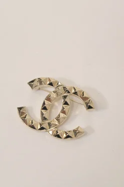 Gold-finish metal Coco Mark brooch