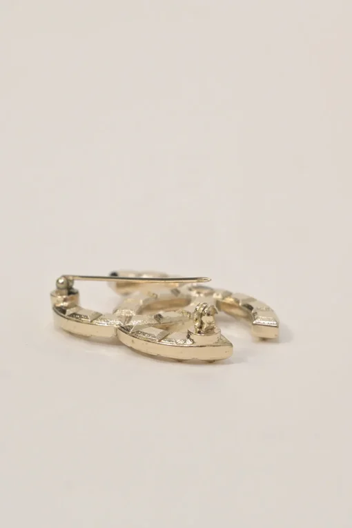 Gold-finish metal Coco Mark brooch