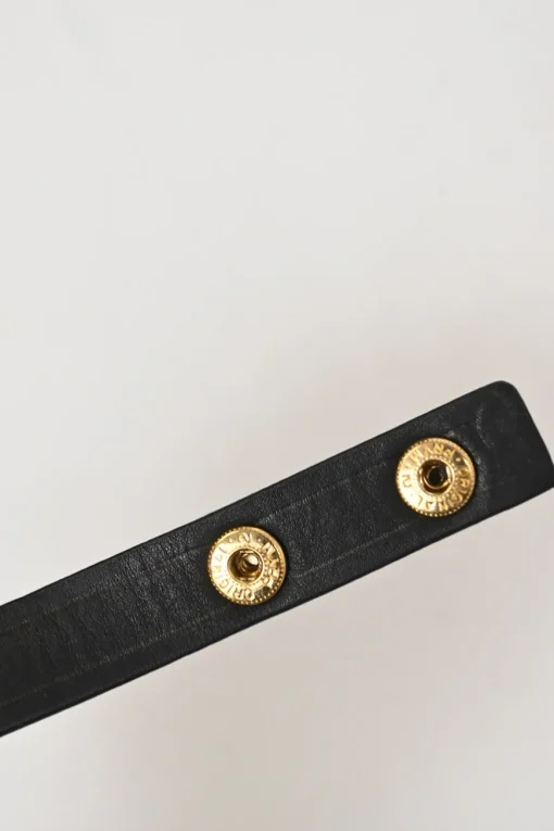 Gold-finish metal herringbone chainlink and leather snap necklace