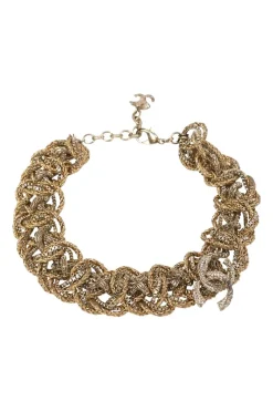 Gold-finish metal multi-strand twist chain bracelet with strass Coco Mark motif