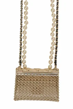 Gold-finish metal, resin, and leather micro flap bag crossbody bag necklace with faux pear and chainlink strap