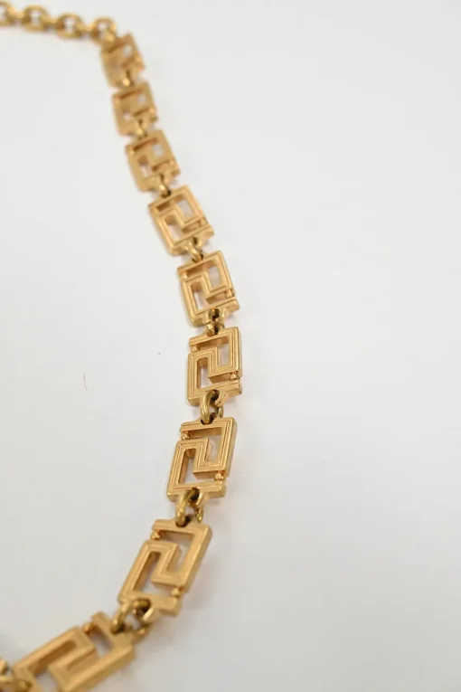 Gold-plated brass signature Greca necklace with lobster clasp fastening