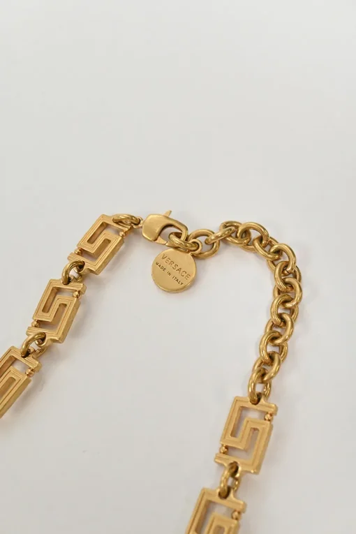 Gold-plated brass signature Greca necklace with lobster clasp fastening