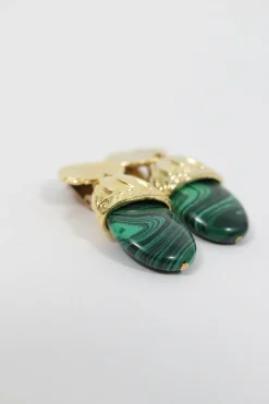 gold-plated ear clip with dangling green stones