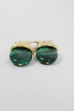 gold-plated ear clip with dangling green stones
