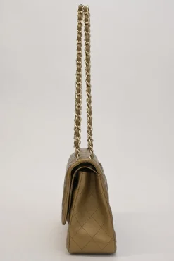 Gold-tone foiled matelassé leather 2012-2013 Jumbo double flap shoulder bag with gold-tone metallic hardware