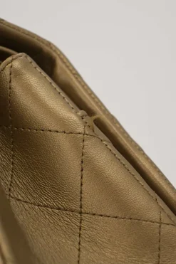 Gold-tone foiled matelassé leather 2012-2013 Jumbo double flap shoulder bag with gold-tone metallic hardware