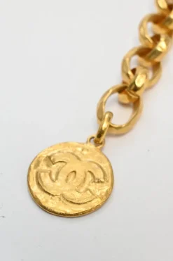 Gold-tone hammered metal chunky logo charm chain belt