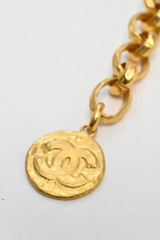 Gold-tone hammered metal chunky logo charm chain belt