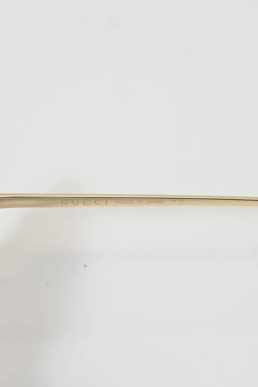 Gold-tone metal and tinted polycarbonate oversized square-shape sunglasses