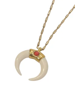 Gold-tone metal Zanzibar tube link necklace with horn pendant