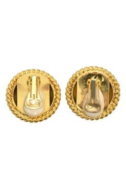 Gold-tone metallic clip-on dome earrings with braided edges