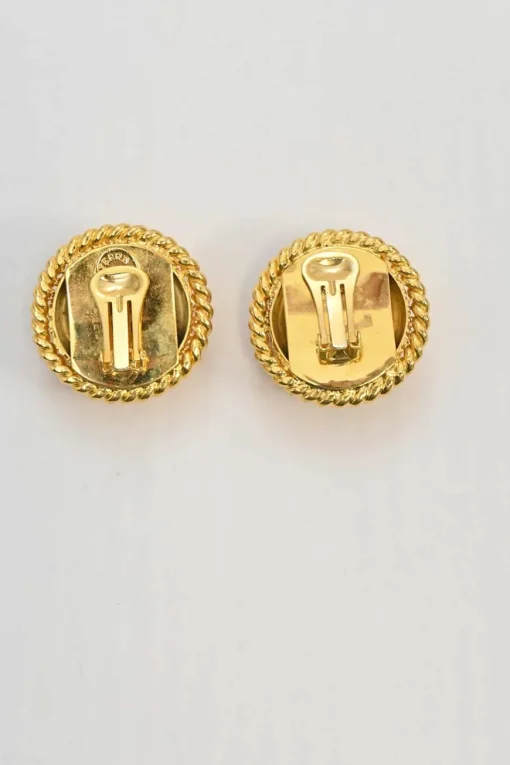Gold-tone metallic clip-on dome earrings with braided edges
