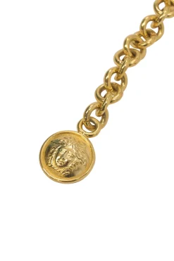 Gold-tone metallic Medusa medallion chain belt with hook fastening