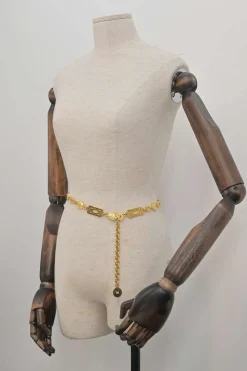Gold-tone metallic Medusa medallion chain belt with hook fastening