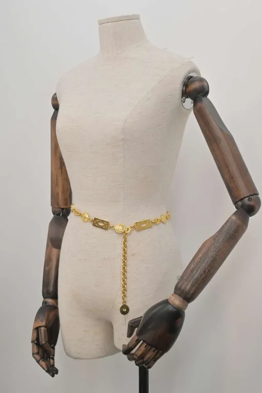 Gold-tone metallic Medusa medallion chain belt with hook fastening