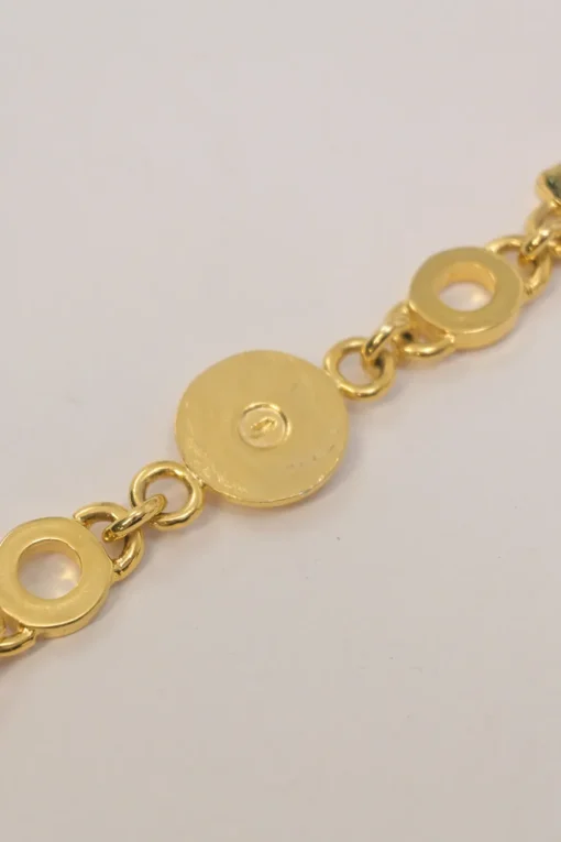 Gold-tone metallic Medusa medallion chain belt with hook fastening