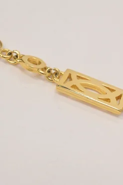 Gold-tone metallic Medusa medallion chain belt with hook fastening